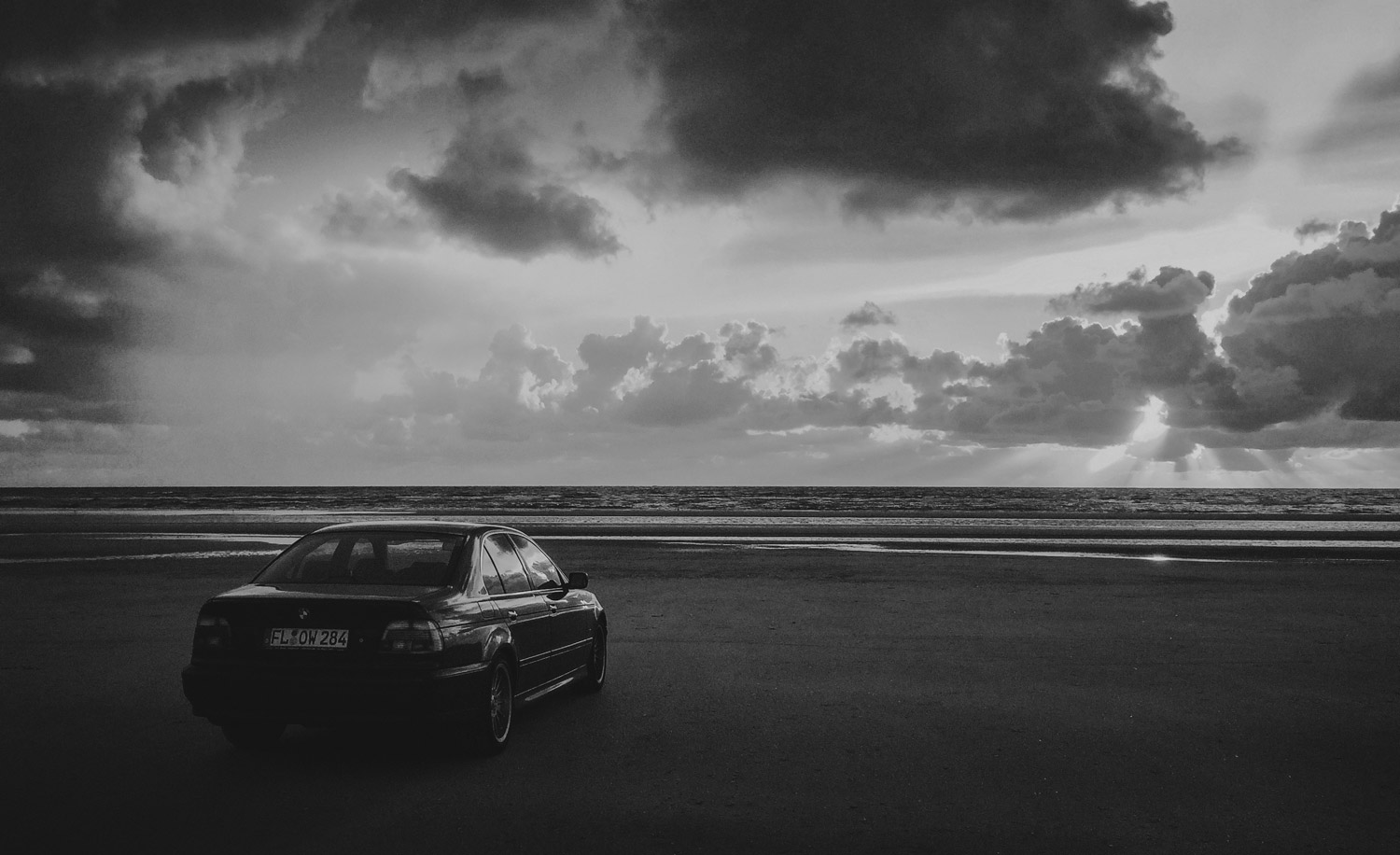 Car at Lakolk beach in Denmark